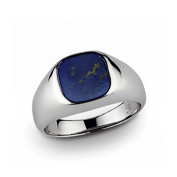 Sterling silver ring with a blue lapis lazuli stone on a white background