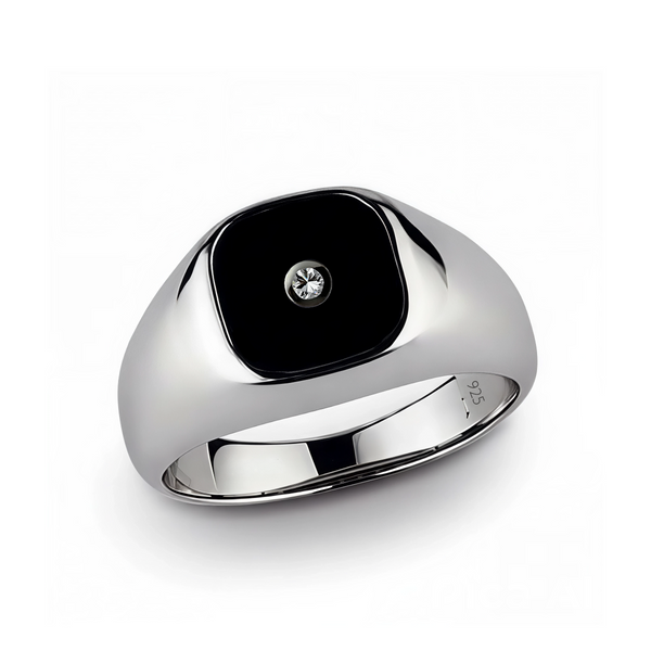 Silver ring with a black square stone and diamond on a white background